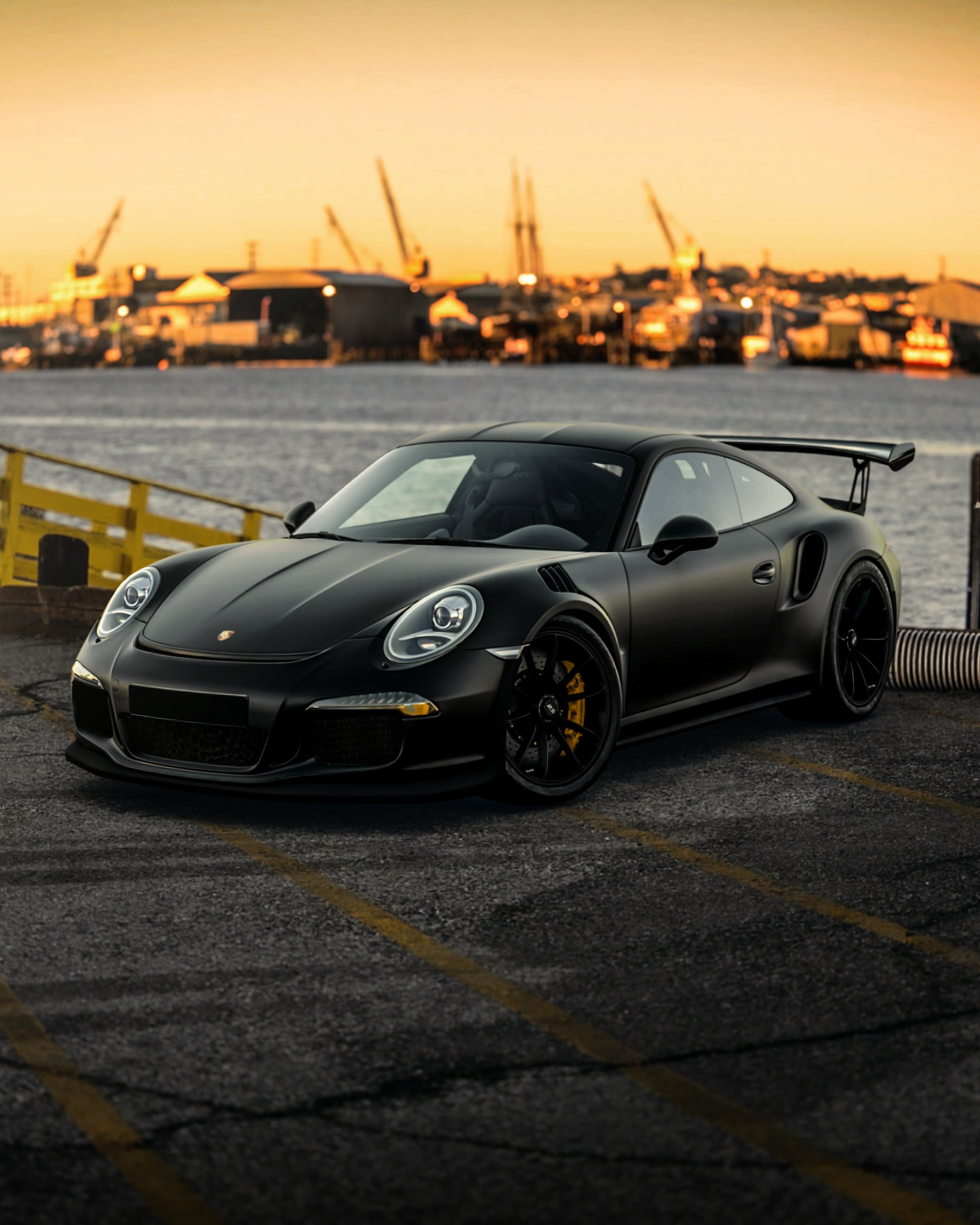 Matte black Porsche 911 GT3 RS photographed at dusk